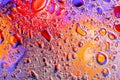 Colorful abstract background. Water drops rainbow colors on glass. Amazing abstract water drops on glass texture or background Royalty Free Stock Photo