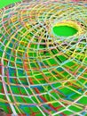 Colorful Abstract dreamcatcher Web up close for texture and detail on a green background Royalty Free Stock Photo