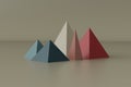 Colorful abstract geometric background with three-dimensional solid figures. Pyramid prism arranged on gray background Royalty Free Stock Photo