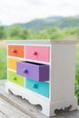 Colorful of accessories cabinet with drawer