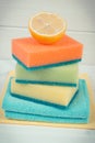 Colorful accessories and lemon as natural, nontoxic detergents for cleaning different surfaces