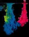 Colorful acrylic Ink blend in water. Color Explosion. Royalty Free Stock Photo