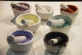 Colorful acrylic powder color in kitchen mortar and pestle or mo