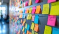Colorful Adhesive Notes on Gray Wall in Office for Planning and Brainstorming Royalty Free Stock Photo