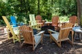 Colorful Adirondack Chairs around Fire Pit