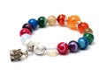 Colorful of agate, jasper bracelet decorate with silver crown pendant