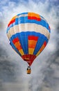 Colorful airballoon in a dangerous flight up Royalty Free Stock Photo