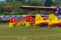 Colorful airplane tails of Extra EA-300 model at Hangariada aeronautical festival shows