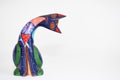Colorful alebrije. Mexican hand painted wooden handicraft in the shape of a cat.