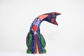 Colorful alebrije. Mexican hand painted wooden handicraft in the shape of a cat.