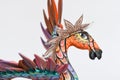 Colorful alebrije. Mexican hand painted wooden handicraft in the shape of a horse with wings.