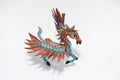 Colorful alebrije. Mexican hand painted wooden handicraft in the shape of a horse with wings.