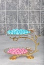 Colorful almond candies in the stylish, crystal candy bowl, almond sweets. The Sugar Feast concept. (Turkish name Ramadan -