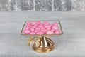 Colorful almond candies in the stylish, crystal candy bowl, almond sweets. The Sugar Feast concept. (Turkish name Ramadan -