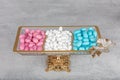 Colorful almond candies in the stylish, crystal candy bowl, almond sweets. The Sugar Feast concept. (Turkish name Ramadan -