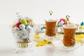 Colorful almond candies in the stylish,crystal candy bowl on the white table