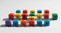 Colorful alphabet dice arranged on a white surface, spelling words Royalty Free Stock Photo