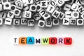 Colorful alphabet word cube of TEAMWORK