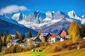 colorful alpine houses against mountain range