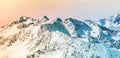 Colorful Alpine panorama. Snow-capped mountain peaks