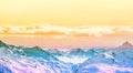 Colorful Alpine panorama. Snow covered mountain peaks
