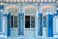 Colorful ancient antique blue wooden window Colonial style architecture building