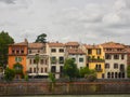 Colorful ancient houses along the Adige River in Verona, Italy