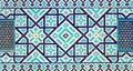 Colorful ancient traditional Uzbek pattern on the ceramic tile on the wall of the mosque