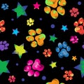 Colorful animal paw print trails and stars