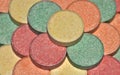 Colorful antacid pills up close.