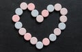 Colorful Antacid Tablets in a Heart Shape
