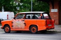 Colorful antique, vintage style East German produced car in side view