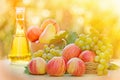 Colorful apples, white grapes and white wine