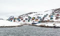 Colorful arctic fishing village houses at the rocky fjord  in the middle of nowhere, Kangamiut Royalty Free Stock Photo