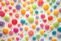 Colorful array of lollipops are arranged in a pattern on a white background. Royalty Free Stock Photo