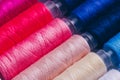 A Colorful Array of Spools of Thread Displaying Various Shades Ideal for Sewing, Crafting, and Creative Projects Royalty Free Stock Photo