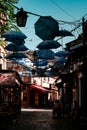 Colorful array of umbrellas suspended above tables of a cafe in Skopje Royalty Free Stock Photo