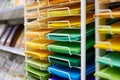 Colorful art papers on shelf display in stationery store