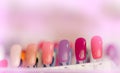 Colorful artificial Nails in nail salon shop. Set of false nails for customer to choose color for manicure or pedicure in nail Royalty Free Stock Photo