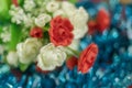 Colorful artificial rose flowers on blue bokeh background Royalty Free Stock Photo