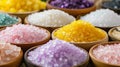 Colorful artisanal bath salts in wooden bowls Royalty Free Stock Photo