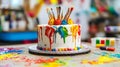 Colorful artistic cake with paintbrushes and vibrant drips Royalty Free Stock Photo