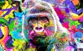 Colorful artistic gorillas monkey muzzle with bright paint splatters on abstract background