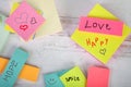 Colorful assorted posted notes with hearts love happy hope and smile affirmations hand written messages Royalty Free Stock Photo