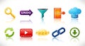 Colorful assorted web icons displayed with reflections on a white surface. Royalty Free Stock Photo