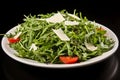 Colorful assortment of fresh vegetables in a white plate, perfect for a healthy and appetizing salad