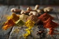 Colorful assortment of spices on rustic wooden background