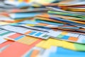 abstract close-up of a colorful stack of documents and reports, showcasing data visualization and information overload in a blurre Royalty Free Stock Photo