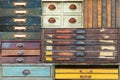 Colorful assortment of vintage wooden drawers and books Royalty Free Stock Photo