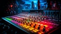 Colorful Audio Spectrum Display over Sound Mixer Console in a Dark Recording Studio Royalty Free Stock Photo